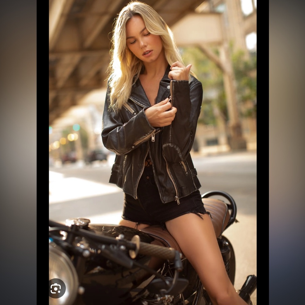 Black real leather moto jacket women’s US size small or 4-6